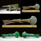 WESTERN ASIATIC BRONZE HEAD OF AXE/PICK

 Ca. 1200 - 800 BC A bronze socketed axe head with a curved blade edge, a slender, socketed neck, and a pic...