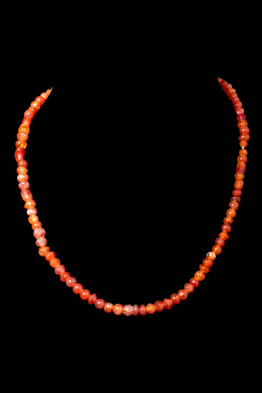 WESTERN ASIATIC CARNELIAN NECKLACE 

 Ca. 500 BC A Western Asiatic Bactrain ne...