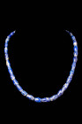 WESTERN ASIATIC LAPIS LAZULI NECKLACE WITH BI-CONICAL BEADS

 Ca. 2600 - 2000 BC A Western Asiatic necklace made of large blue and cream lapis lazul...