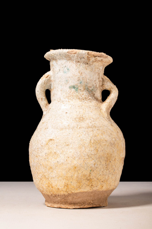 ROMANO-EGYPTIAN CREAM FAIENCE AMPHORISKOS

 Ca. 30 BC - AD 200 A Romano-Egypti...