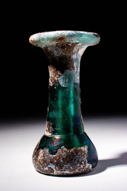 ROMANO-EGYPTIAN GLASS UNGUENTARIUM

 Ca. AD 100 - 400 A Roman glass unguentari...