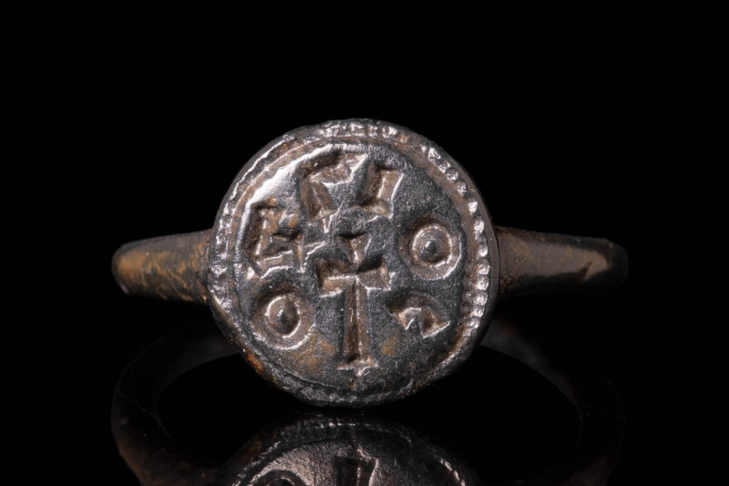 BYZANTINE RING WITH A CROSS AND INSCRIPTION

 Ca. AD 900 - 1300 A medieval rel...