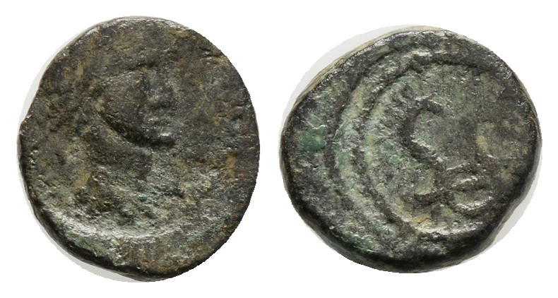 Roman Coins AE Bronze. 0,89 g. 10,5 mm.