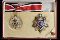 Egypt, Order of Merit, U.A.R. Issue, by Bichay, Grand Commander's set of insignia, comprising neck badge, in silver, gilt and enamels, 59mm, and breas...