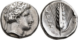 LUCANIA. Metapontion. Circa 340-330 BC. Didrachm or Nomos (Silver, 20 mm, 7.82 g, 10 h), Phi..., magistrate. Head of Demeter to right, wearing wreath ...