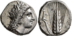 LUCANIA. Metapontion. Circa 330-290 BC. Didrachm or Nomos (Silver, 20 mm, 7.75 g, 8 h). Head of Demeter to right, wearing wreath of grain ears, triple...