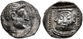 PHILISTIA (PALESTINE). Uncertain mint. Mid 5th century-333 BC. Obol (Silver, 9 mm, 0.77 g, 12 h). Archaic male head to right. Rev. Facing bust of Bes ...