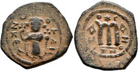 ISLAMIC, Time of the Rashidun. Pseudo-Byzantine types. Fals (Bronze, 21 mm, 3.65 g, 4 h), imitating the EN T૪TO NIKA follis of Constans II, uncertain ...