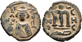 ISLAMIC, Umayyad Caliphate. temp. Mu'awiya I ibn Abi Sufyan, AH 41-60 / AD 661-680. Fals (Bronze, 22 mm, 4.26 g, 7 h), Arab-Byzantine type, Hims. K/A/...