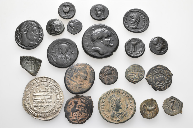 A lot containing 20 silver and bronze coins. Including: Greek, Roman Provincial,...