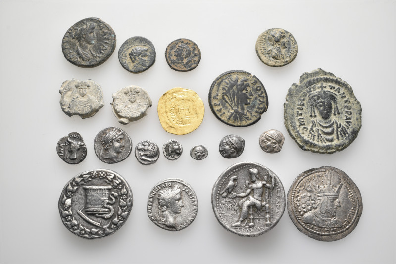 A lot containing 20 gold, silver, bronze and lead coins. Including: Greek, Roman...