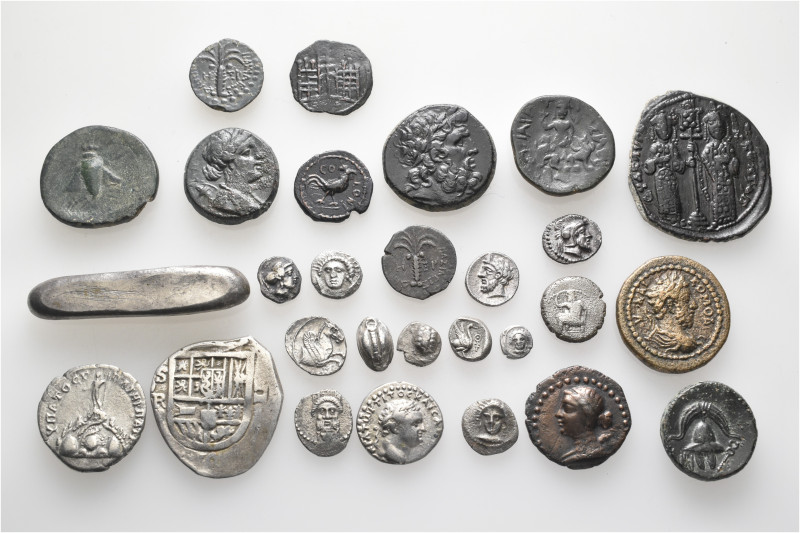 A lot containing 28 silver and bronze coins. Including: Greek, Roman Provincial,...