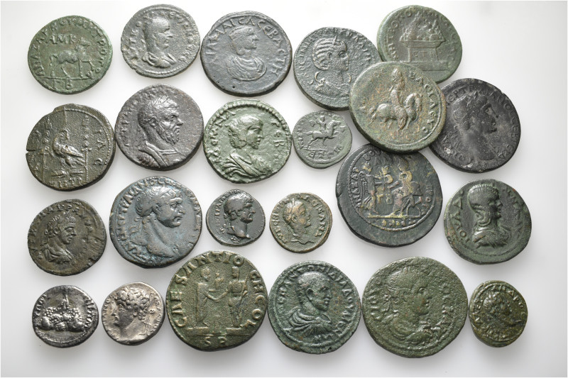 A lot containing 23 silver and bronze coins. All: Roman Provincial. Fine to good...