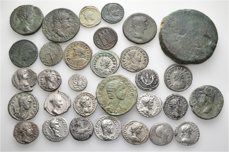 A lot containing 31 silver and bronze coins. Including: Greek, Roman Provincial,...