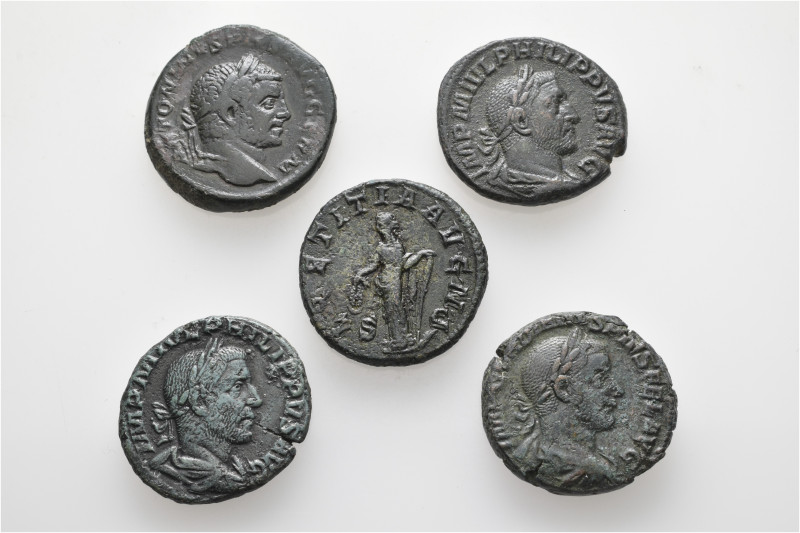 A lot containing 5 bronze coins. All: Roman Imperial. Asses. Very fine. LOT SOLD...