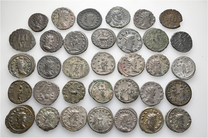 A lot containing 34 silver and bronze coins. All: Roman Imperial. Antoniniani. A...