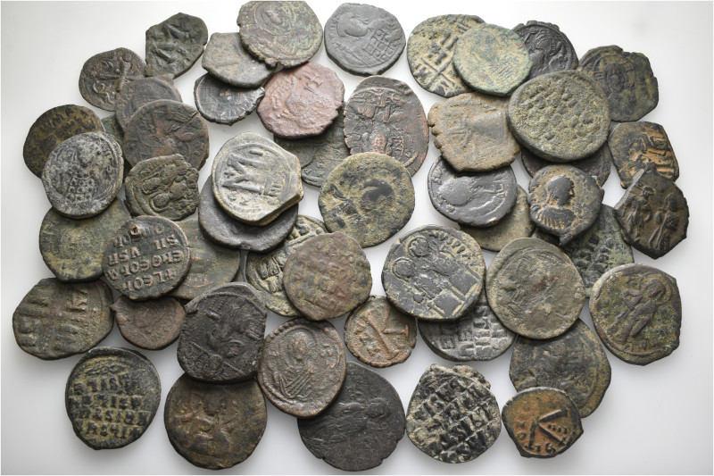 A lot containing 52 bronze coins. All: Byzantine. About fair to fine. LOT SOLD A...