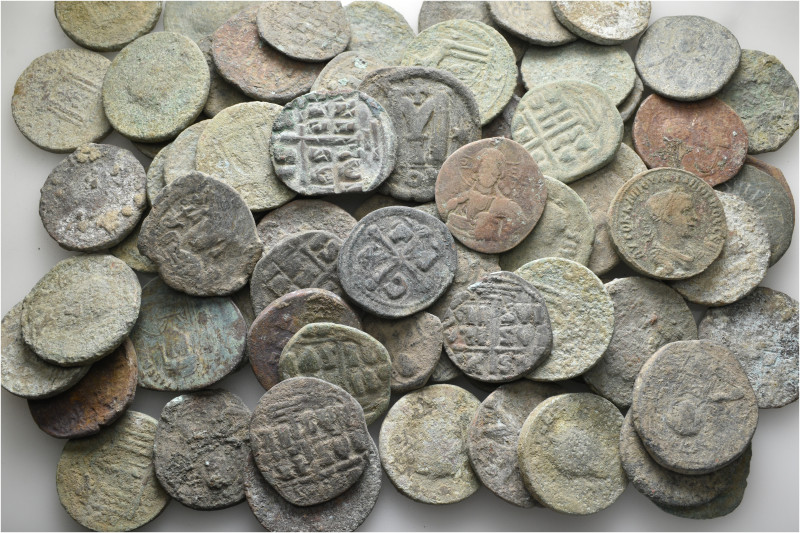 A lot containing 74 bronze coins. Including: Roman Provincial and Byzantine. Fai...