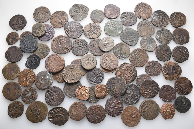 A lot containing 71 bronze coins. All: Islamic. Fine to very fine. LOT SOLD AS I...