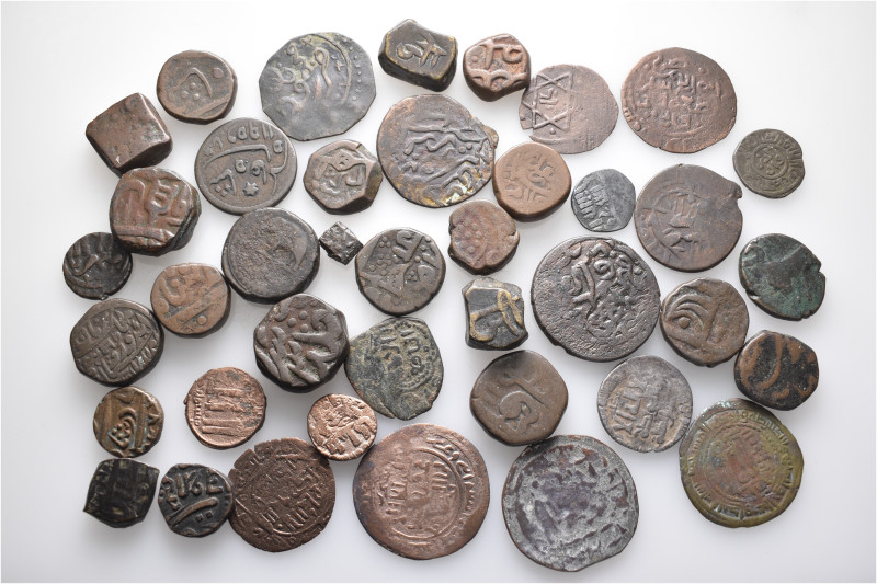 A lot containing 40 bronze coins. All: Central Asian and Islamic. Fine to very f...