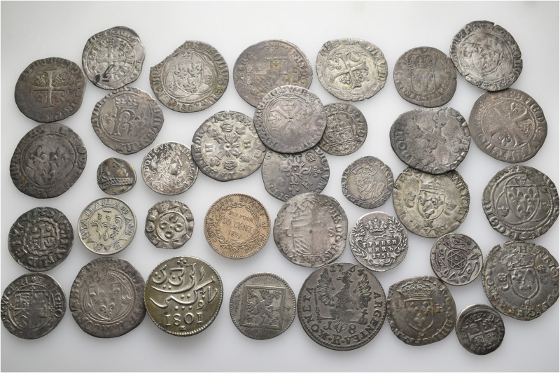 A lot containing 34 silver coins. All: World. Fine to extremely fine. LOT SOLD A...
