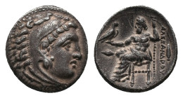 KINGS OF MACEDON. Alexander III, Drachm (336-323 BC). AR Silver, Kolophon Obv:Head of Herakles right, wearing lion skin Rev: AΛEΞANΔPOY, Zeus seated l...