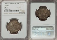 Zurich. Canton 10 Schillings 1809-B MS65 NGC, KM182, HMZ-21176d. Ornate shield within circle / Legend and date within ornate frame within sprigs, date...