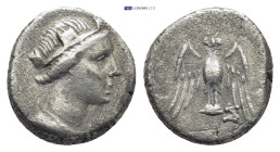 PONTOS, Amisos. Circa 300-125 BC. AR (15mm, 3.9 g). Turreted head of Hera right / Eagle standing facing on shield, with wings spread; monograms in inn...