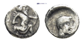 CILICIA, Uncertain. 351-338 BC. AR Tetartemorion (5mm, 0.17 g). Persian king in kneeling-running stance right, holding dagger and bow / Youthful male ...