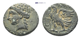 Caria, Halikarnassos. Ae, (11mm, 1.39 g). 3rd century BC. Obv: Head of Apollo left. Rev.: ΑΛΙ; Eagle standing to left, wings open; to left, kithara....