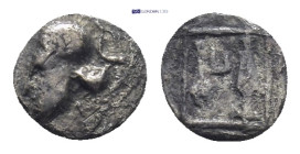 Thraco-Macedonian Region(?), uncertain mint AR Hemiobol. (6mm, 0.15 g) 5th-4th centuries BC. Crested Corinthian helmet to left / Amphora and kerykeion...