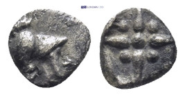 Asia Minor, uncertain or Troas, Kolone. AR, Tetartemorion (6mm, 0.18 g). Circa 500-400 BC. Obv.: Helmeted head of Athena right. Rev.: Star of four ray...