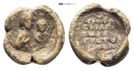 Byzantine Lead Seal (16mm, 3.5 gr) Obv: Nimbate and draped half length bust of the Virgin Mary, facing slightly to right, presenting the youthful Chri...