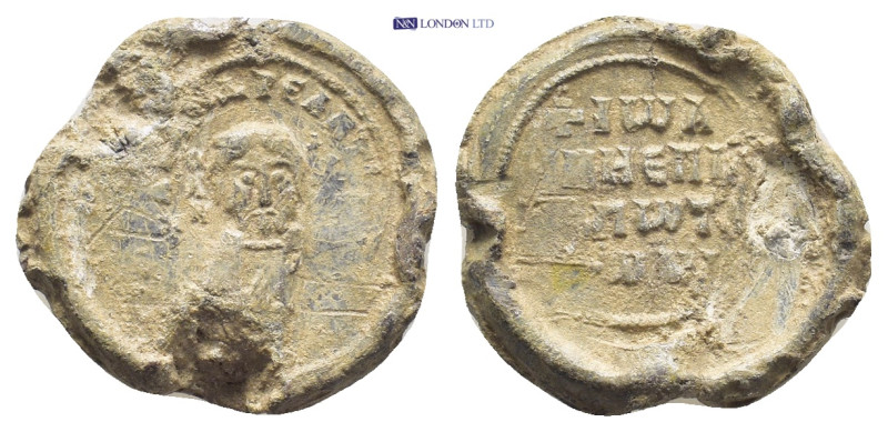 Byzantine Lead Seal (20mm, 5.8 gr) Obv: Bust of Saint. Rev: Inscription of four ...