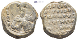 Byzantine Lead Seal (23mm, 12.5 gr) Obv: Bust of Saint Basil facing, nimbate, raising his right hand in benediction and holding book of Gospels in his...
