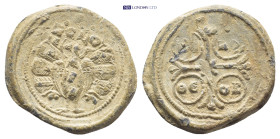 Byzantine Lead Seal (23mm, 6.9 gr) Obv: Peacock standing facing on globe, head right, with tail feathers spread, within border of dots. Rev: Cross mon...