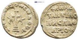 Byzantine Lead Seal (24mm, 7.8 gr) Obv: Large patriarchal cross on steps, with floral ornaments springing from the base and X's at the intersections; ...