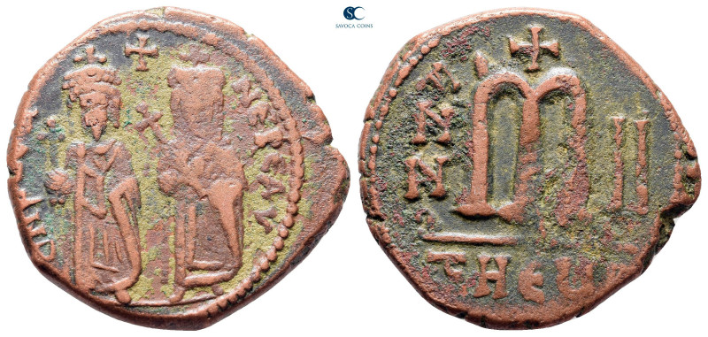 Phocas, with Leontia AD 602-610. Theoupolis (Antioch)
Follis or 40 Nummi Æ

2...