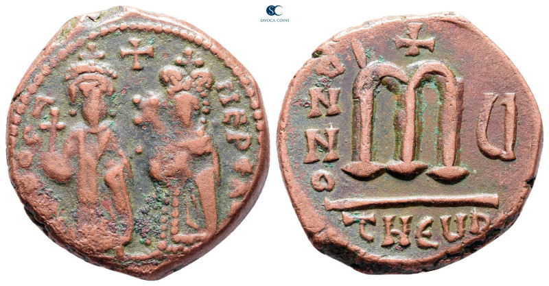 Phocas, with Leontia AD 602-610. Theoupolis (Antioch)
Follis or 40 Nummi Æ

2...