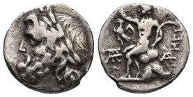 Arkadia, Megalopolis AR Hemidrachm, 2.14 g 15.27 mm. Circa 100-80 BC. 
Obv: Laureate head of Zeus to left
Rev: Pan seated to left on rocks, raising ri...