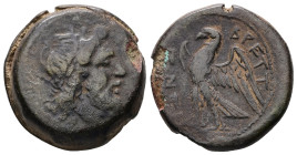 Bruttium, The Bretti. Ae Unit, 10.16 g 22.51 mm.(Drachm). Circa 214- 211 BC. 
Obv: Laureate head of Zeus to right 
Rev: BPETT[I]ΩN, eagle standing to ...