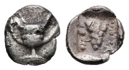 Thraco-Macedonian Region, uncertain mint. AR, Tetartemorion. 0.28 g. - 7.31 mm. 6th-5th centuries BC.
Obv.: Kantharos.
Rev.: Grape-bunch within pellet...