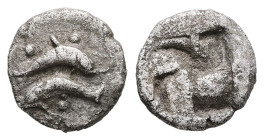 Thrace, Thasos. AR Obol, 0.66 g 8.98 mm. Circa 500-480 BC.
Obv: Two dolphins swimming in opposite directions; pellets around.
Rev: Quadripartite incus...