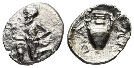 Thrace, Thasos. AR Obol, 0.58 g 13.02 mm. 450-425 BC. 
Obv: Satyr kneeling left, holding kantharos with right hand 
Rev: ΘAΣIΩN, amphora. 
Ref: McClea...