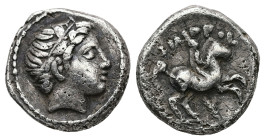 Kings of Macedon, Philip II. 1/5 Tetradrachm, 2.51 g 13.54 mm. 359-336 BC. Amphipolis.
Obv: Head of Apollo right, wearing tainia.
Rev: ΦIΛIΠΠOY. Horse...