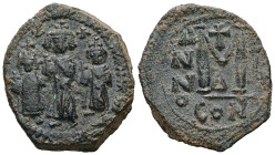 Heraclius, Martina and Heraclius Constantine, AD 610-641. AE, Follis. 9.19 g. 29.08 mm. Constantinople.
Obv: Heraclius in center, flanked by Martina, ...