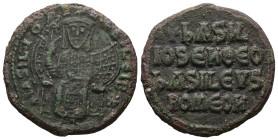 Basil I the Macedonian, 867-886 AD. AE, Follis. 6.97 g. 25.99 mm. Constantinople.
Obv: + bASILIOS bASILЄVS ✱. Emperor, crowned and wearing loros, seat...