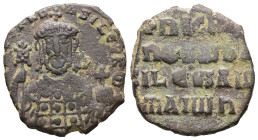 Nicephorus II Phocas, AD 963-969. AE, Follis. 5.28 g. 23.95 mm. Constantinople.
Obv: [nICIF]R b-ASILEV RW. Crowned bust facing, holding labarum and gl...