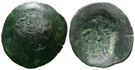 Andronicus I Comnenus, AD 1183-1185. AE, Trachy. 4.67 g. 31.62 mm. Constantinople.
Obv: MHP – ΘV. The Virgin, nimbate, standing facing on dais, wearin...