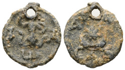 PB Roman provincial lead gnostic amulet (AD 2nd–4th centuries)
Obv.: Abrasax facing, with the head of a rooster and snakes for legs, holding a whip in...